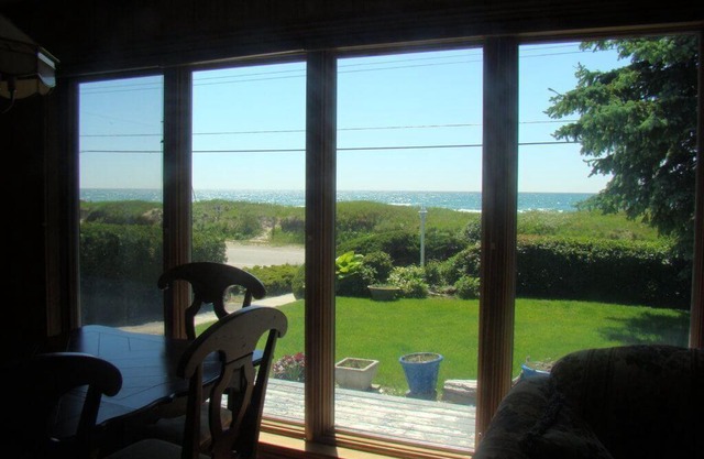 Stunning View From This Stylish 2 Bedroom Waterfront Cottage!