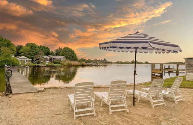 Stunning waterfront home with big yard & dock! Voted #1 rental in all of RI!
