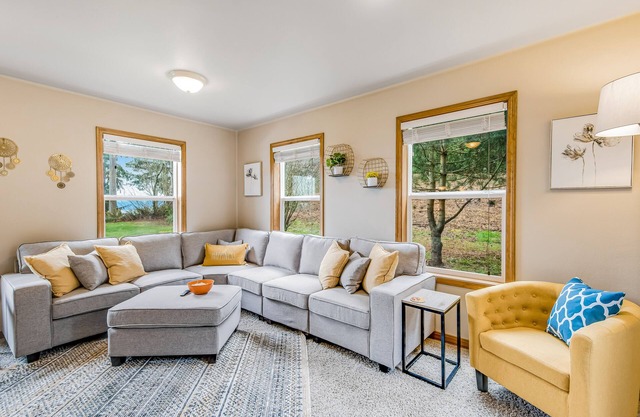 Stunning waterfront getaway with firepit, woodstove, & scenic deck