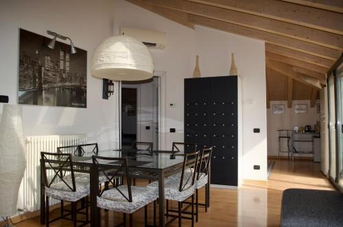 Stupenda mansarda con balcone