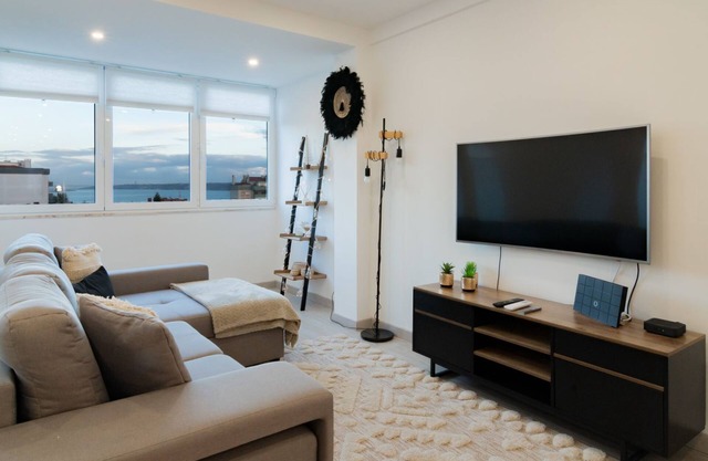 Stylish Apartment W/ River View by LovelyStay