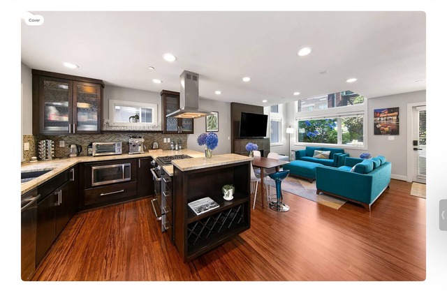 Stylish Queen Anne townhouse with rooftop deck, secure parking, walk score 94!