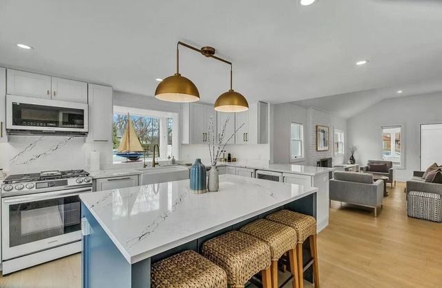 Stylish, spacious, and modern - Just 1 block from a private beach.