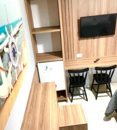 Suíte 31 Privativa com ar condicionado, Frigobar, Vista lateral para o mar, 5 mts da praia