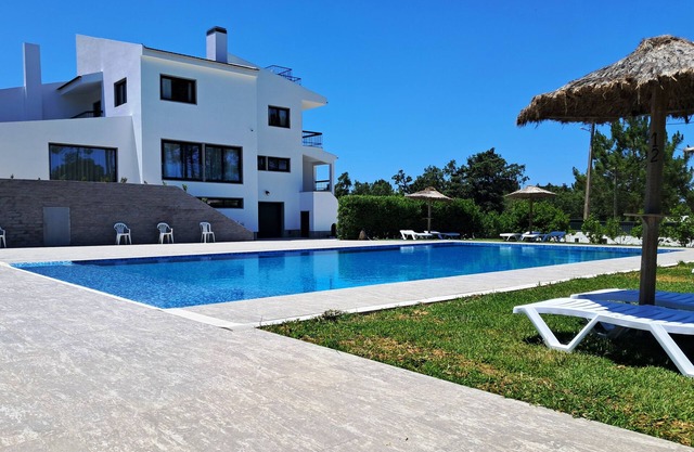 Suíte c/ wc privado, sala e terraço na Casa das Vinhas em Sesimbra