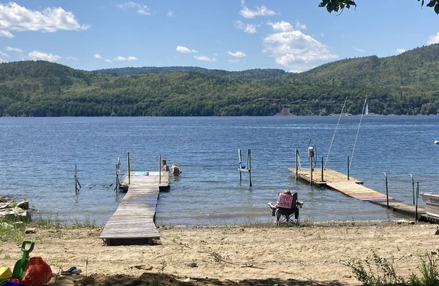 Summer camp on the water w/dock on the bay, gas fireplace.