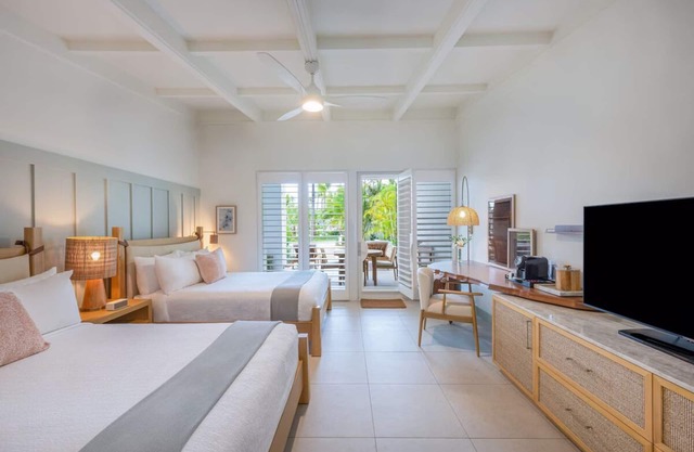 Summer Escapade! Onsite Pool, Steps from the Beach, Pets Allowed, Free Parking!
