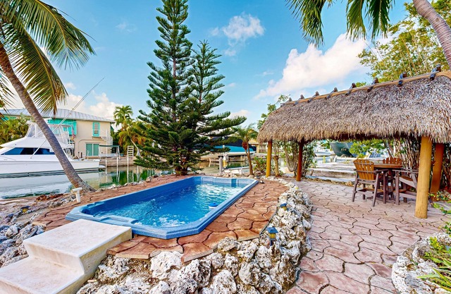 Summerland Canal-Front Escape w/ Plunge Pool, Dock, Tiki Bar, WiFi & Laundry