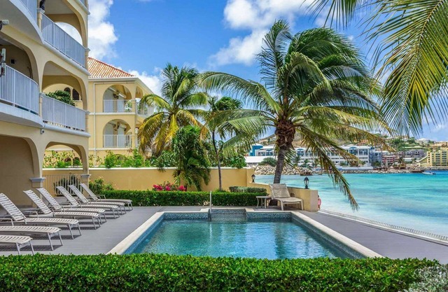 Stunning 2 Bedroom 2 Bath Beachfront with panoramic ocean views, W Elevator!