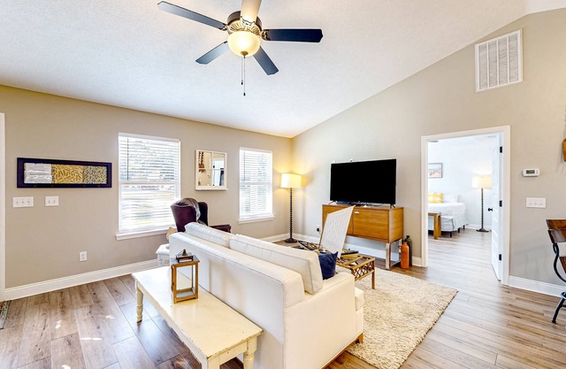 Sunlit dog-friendly Gulf retreat with patio & W/D - moments from beaches & parks