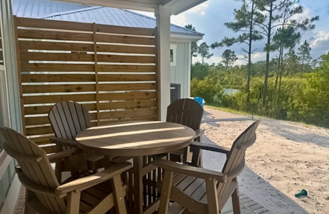 Sunny coastal getaway w/shared pool, firepit, putting green & short beach walk