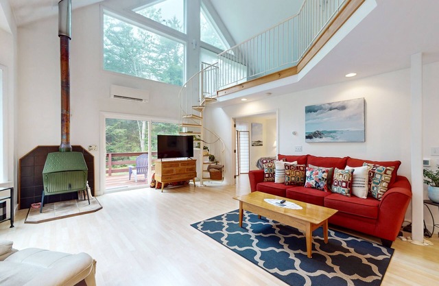 Sunny coastal retreat with deck, grill, beach, dock, & ocean access