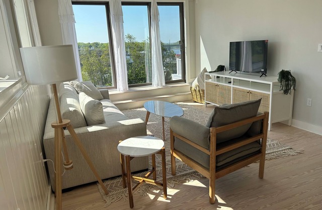 Sunny downtown Belfast apartment with water view, right on Main St near eateries