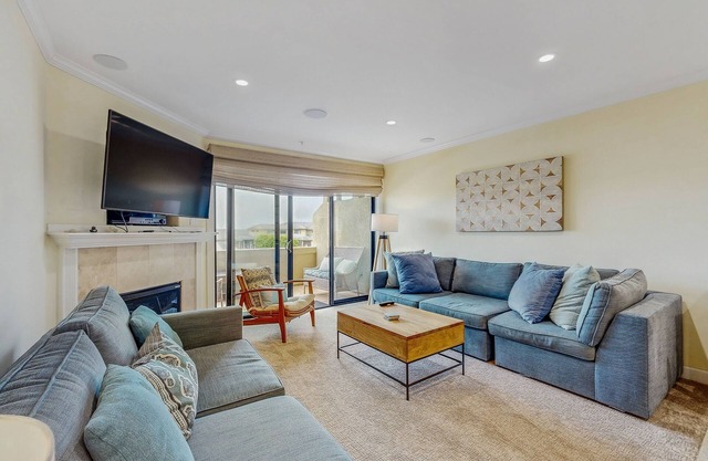 Sunny & serene, two-story, oceanfront condo w/ a shared, heated pool & free WiFi