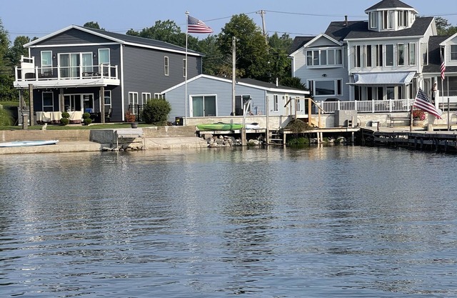 Sunrise Bay 2 - Trendy lakefront home w/sunrise view, boat dock & walk to beach