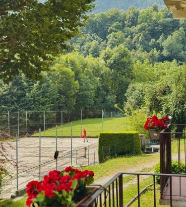 Sunrise Inn & Campo da Tennis