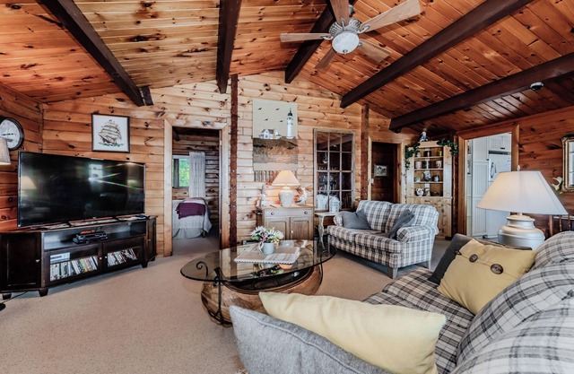 Sunrise Retreat: Waterfront Cottage w/ Hot Tub & Stunning Views