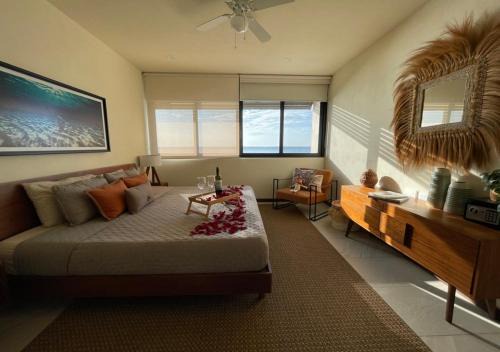Sunset 2BR Apartment Steps from the Beach with Ocean View
