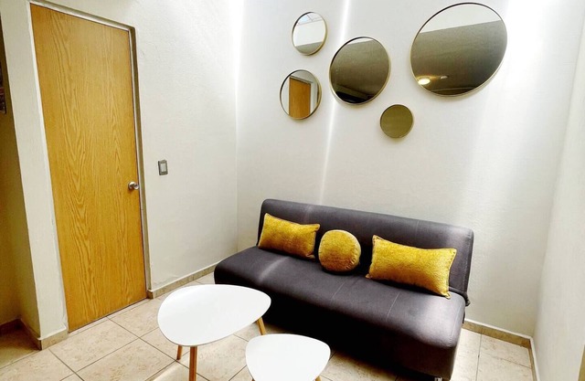 Super clean house with AC, equipped, amenities, desk and garage.