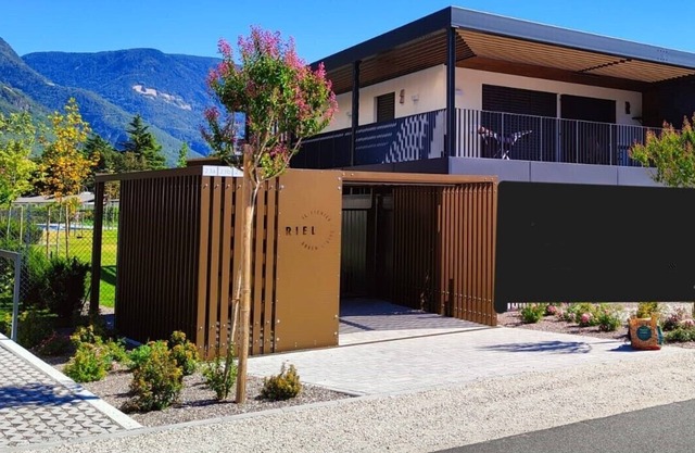 Super Neubauwohnung Bozen Süd mit Aussenpool inmitten Äpfelfelder