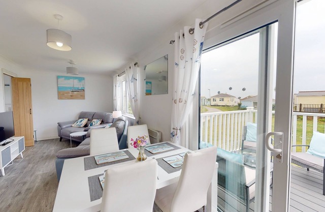 Surrounded by grassy dunes, big skies and just a short walk from the stunning stretch of beach