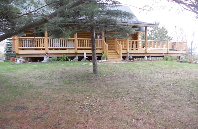 Log Home auf dem See