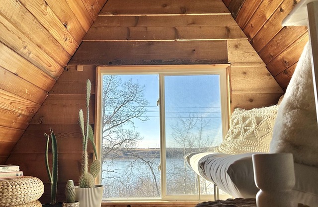 Techni Cabin offers a cozy A-frame blending rustic charm with modern comforts.