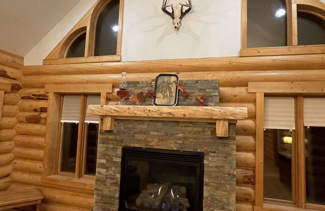 The Canada Goose Lodge . Cozy up by the fire in this secluded Log Lodge.