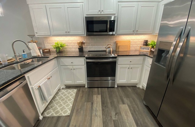 The Copia on Moore-Spacious townhome just 3 miles to U of A, located off of I-49