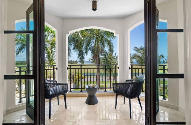The Country Club Residences at Grand Reserve | Balcony with Beach & Golf Course Views | by Otium