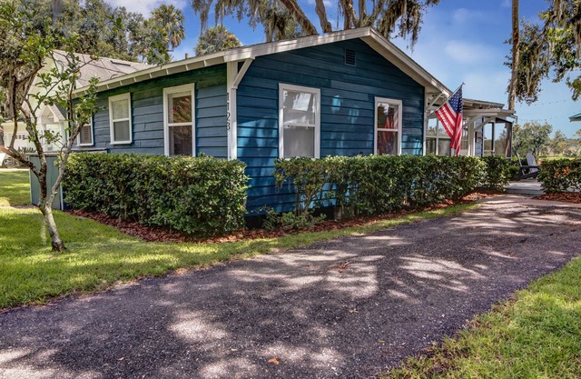The Cozy Euphoric cottage nestled in nature with relaxing River front views.
