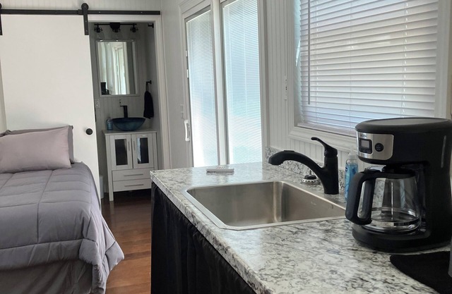 The GiGi is a tiny exquisite house nestled on the river
