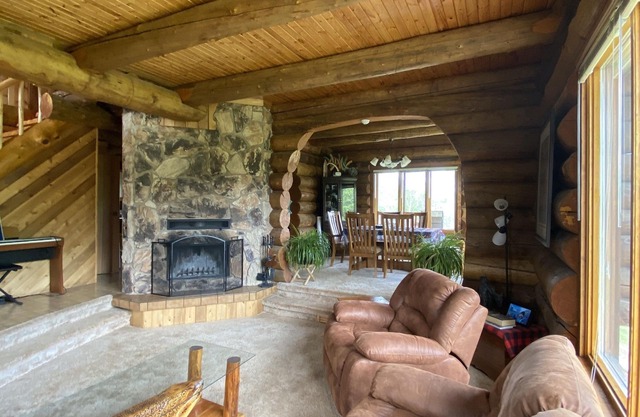 The Lodge--Unique log home on the banks of the river