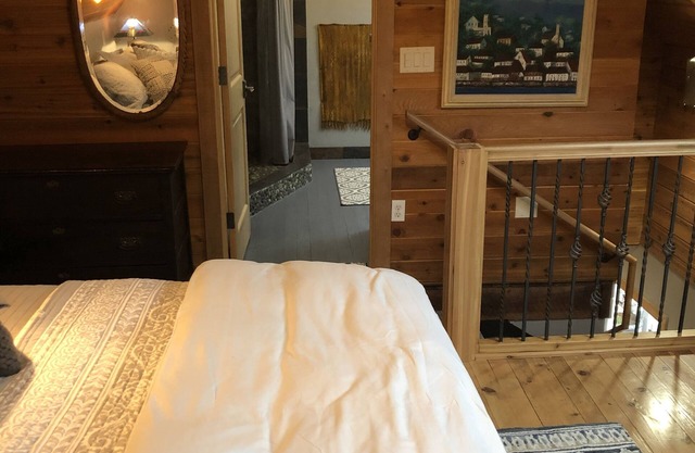 The Loft King Room w/ full kitchen in historic Carriage House building.