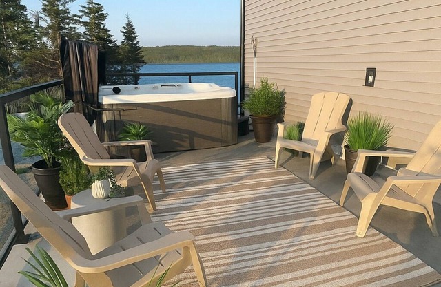 The Luxurious Lakefront Reset on Porters Lake with private beach and hot tub!