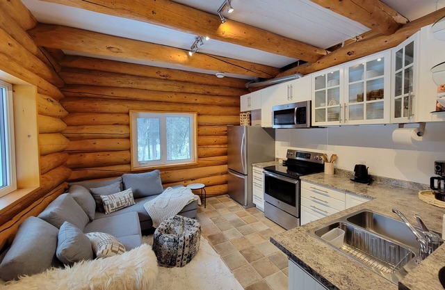 The Meadow Cabin. Enjoy the Northern Lights from your bed or balcany.