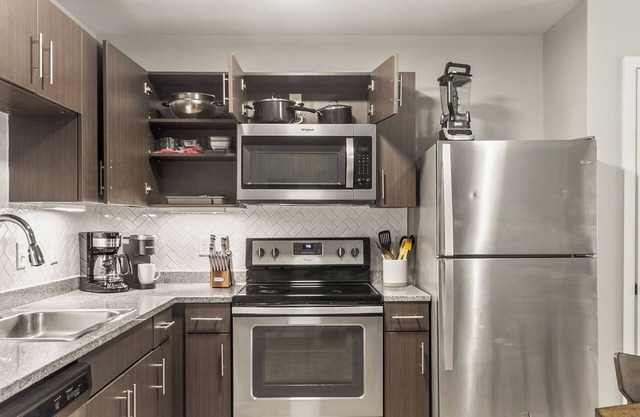 The Melanie 1st Floor Riverfront Condo with Pool & Gym Access