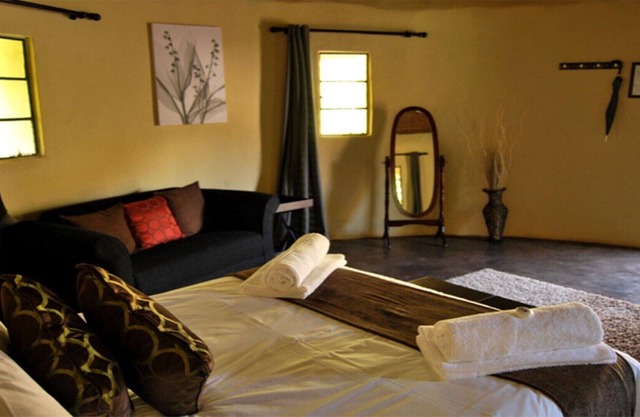 Die Queen-Size-Bed Riverside Hütten
