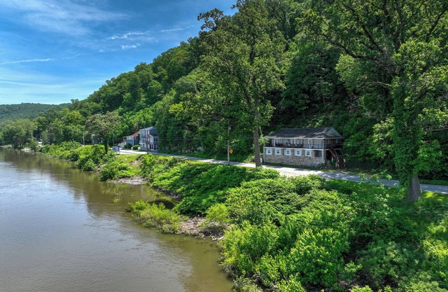 "The Riverfront Serenity Lodge"