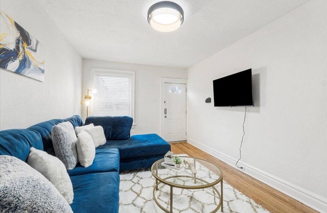 This beautifully designed apartment offers the perfect blend of modern comfort