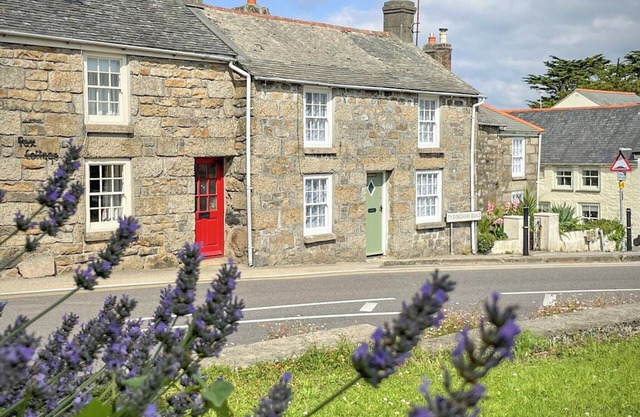 This charming Cornish cottage is full of character with exposed beams and stone walls.