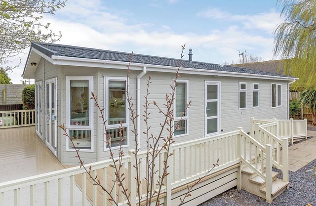 This contemporary and spacious lodge is ideal for a family escape by the sea.