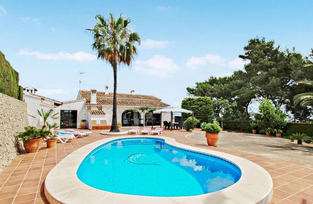 This delightful villa is set amidst its own lush, attractive gardens in the heart of the tranquil Be