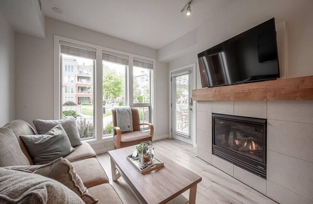 This ground-floor unit overlooks the quiet greenspace at the side and comes fully furnished!