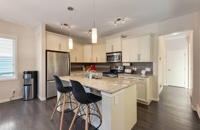 This house is a 1 bedroom(s), 1.5 bathrooms, located in Cochrane, AB.