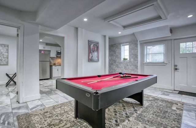 This house is a 8 bedroom(s), 7.5 bathrooms, located in Atlanta, GA.