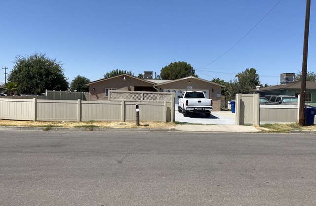 This is a 4 bed room house with 2 bathroom. Parking space. security cameras .