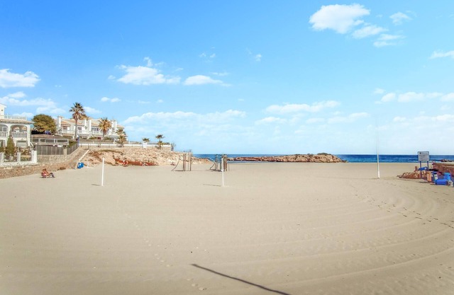 This pretty vacation apartment with a large terrace is located not far from the sea.