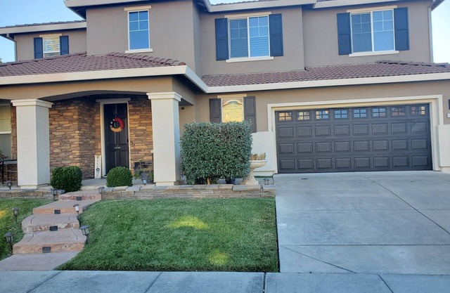 This stunning luxury home is located 10 minutes from the airport and downtown!