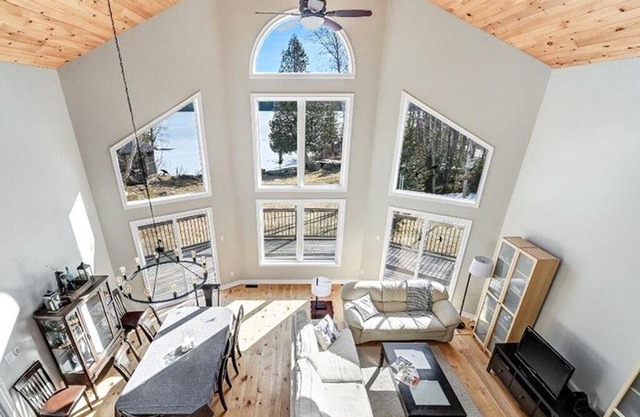 This well equipped lake house has a private beach and all-day sun.
